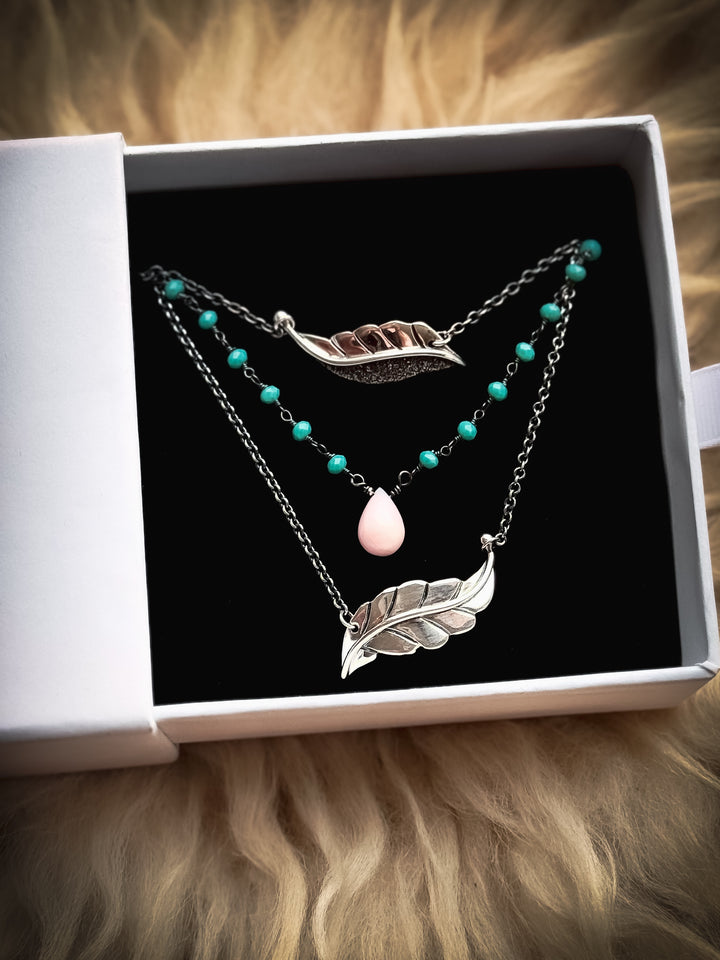Two Berry Leaf necklaces and one Dew Drop Luminary