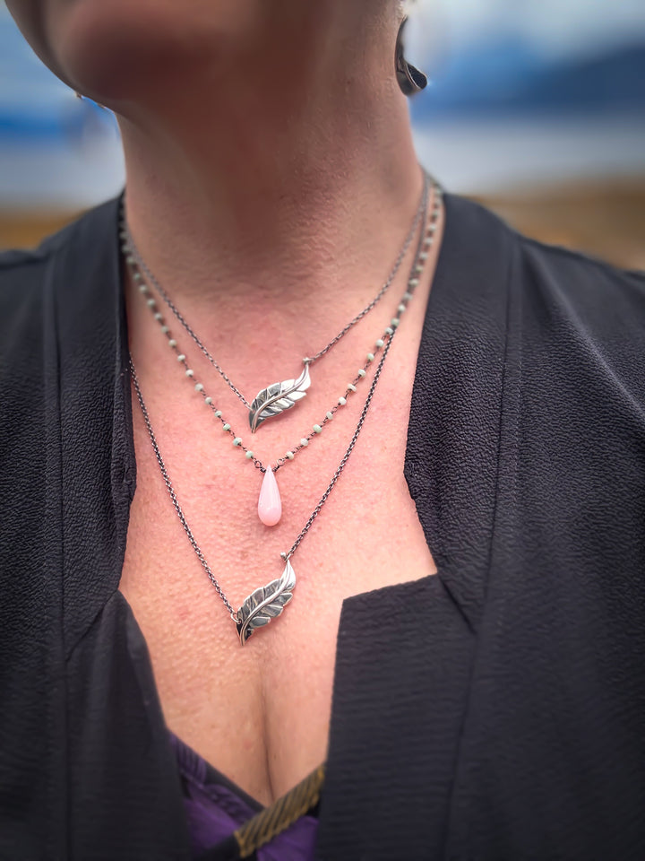 Two Berry Leaf necklaces and one Dew Drop Luminary