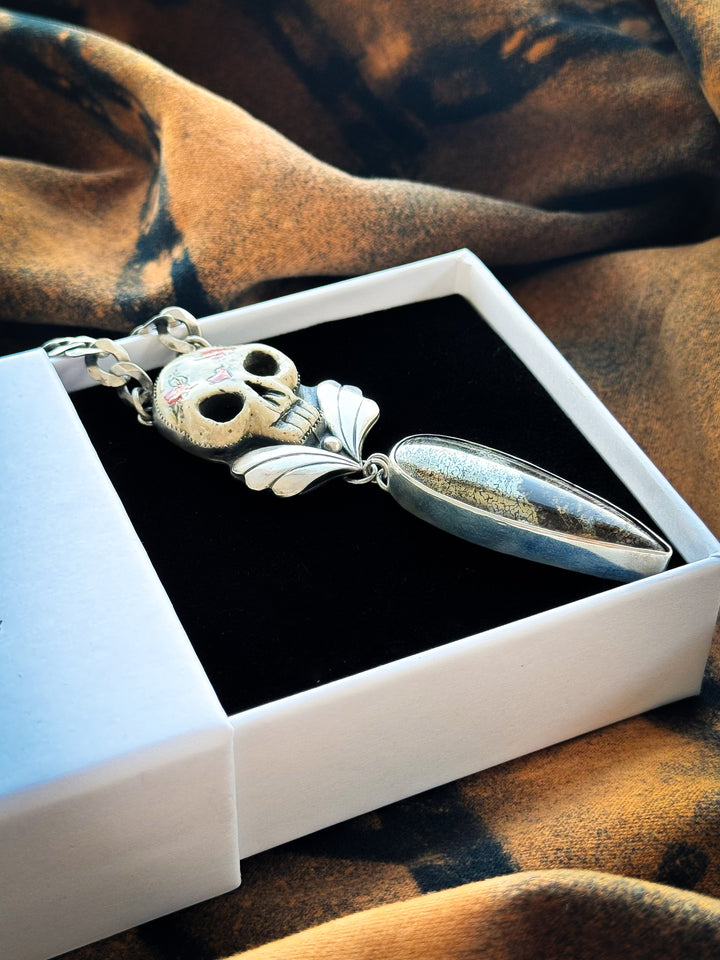 Dinosaur Bone in Pyrite Skull Necklace