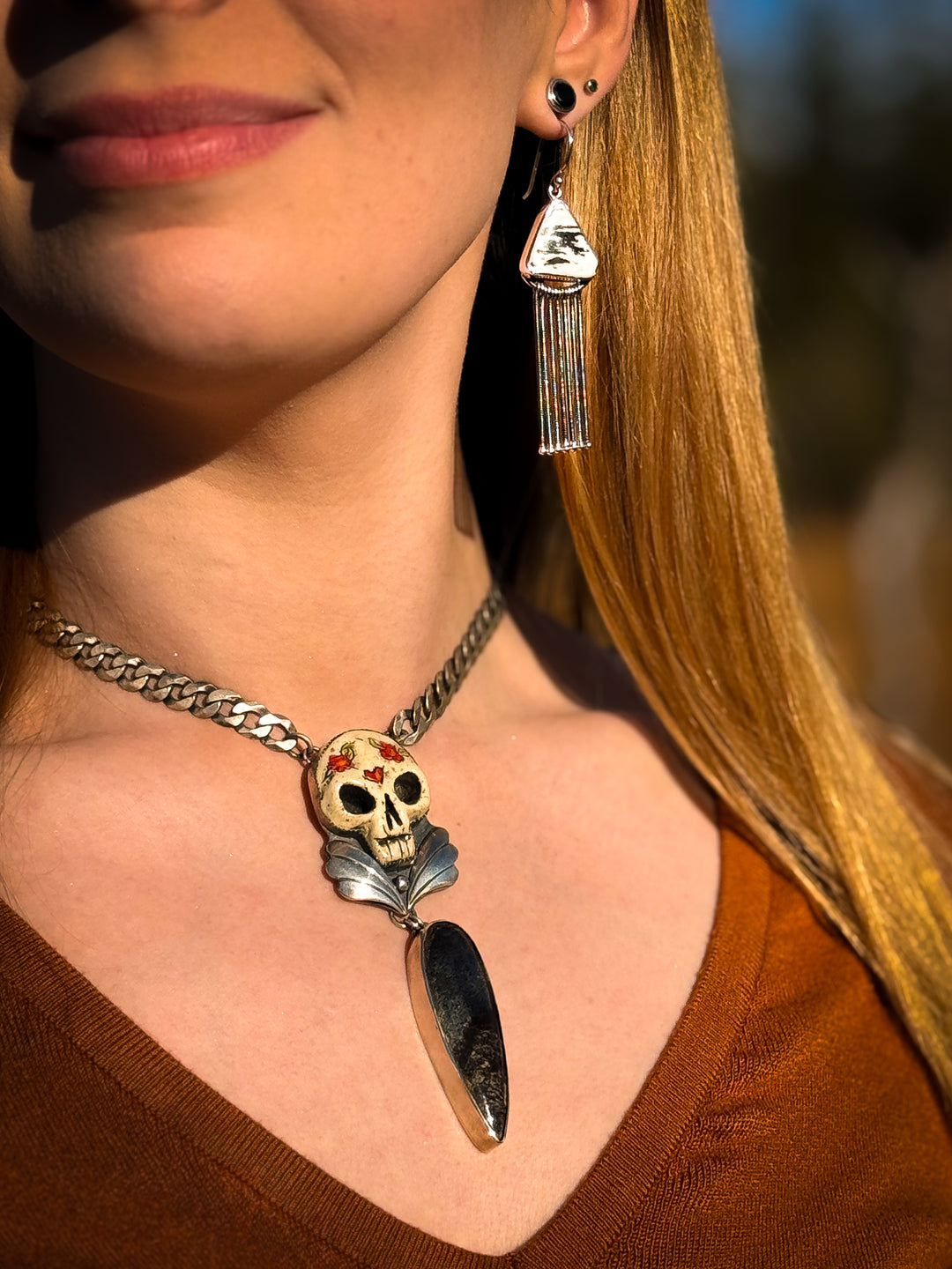 Dinosaur Bone in Pyrite Skull Necklace