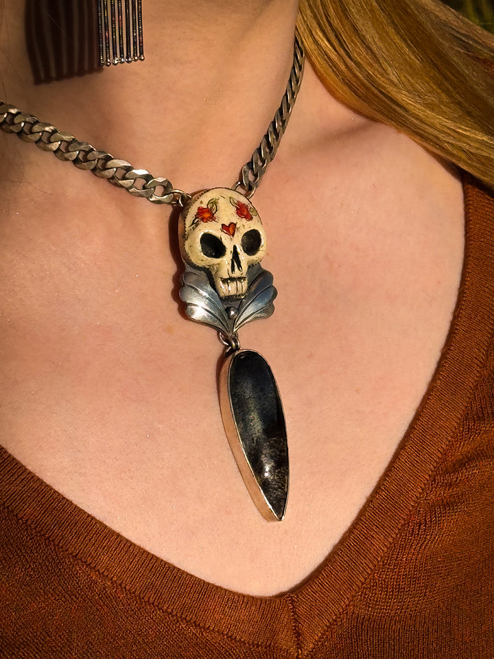 Dinosaur Bone in Pyrite Skull Necklace
